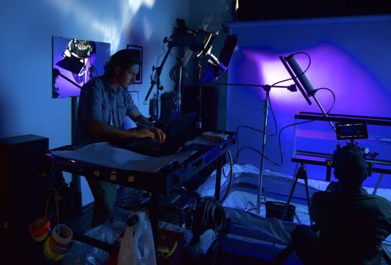 Man utilizing tabletop film production.